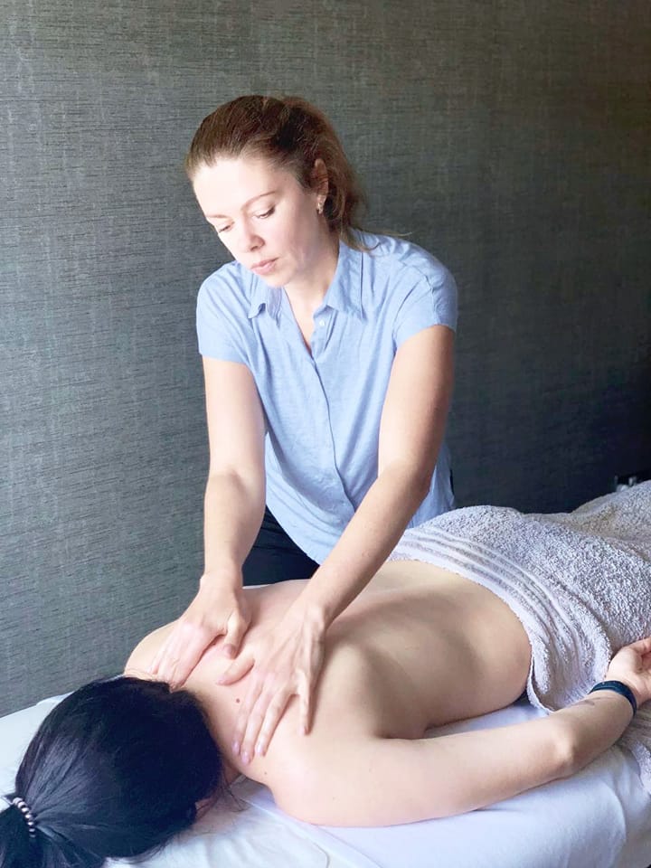 Olena massaging woman